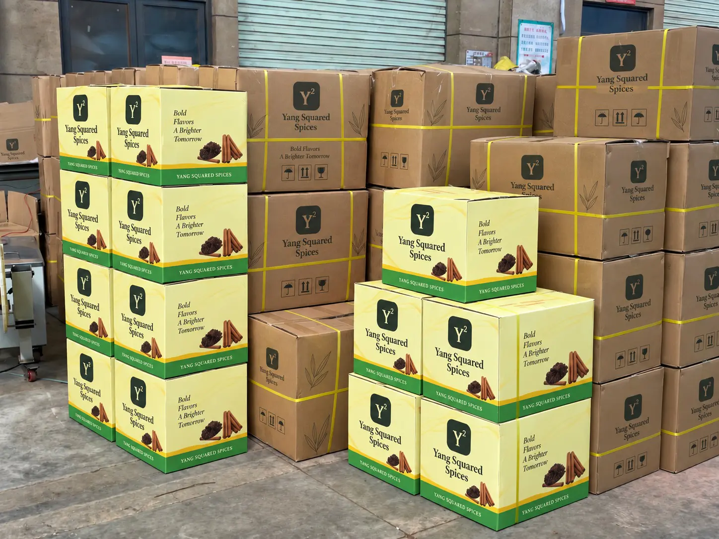 Stacked Yang Squared Spices cartons prepared for packing